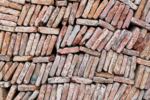 Beautiful background a large lot of old vintage bricks.