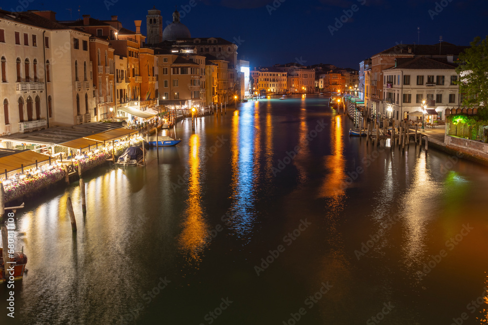 Empty Grand Canal with houses and night lights from above, Venice, Italy
