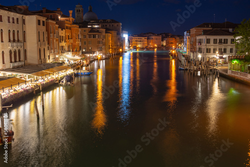 Empty Grand Canal with houses and night lights from above, Venice, Italy 