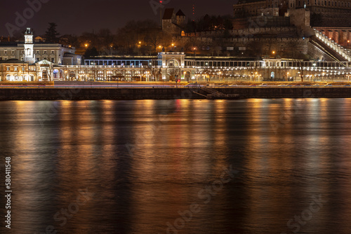 Illuminated Varkert Bazar (is the lower part of the Buda Castle) at night with the Danube river, Budapest, Hungary
