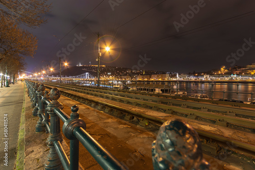 Budapest Danube riverside with lights and tram tracks at night, Hungary
