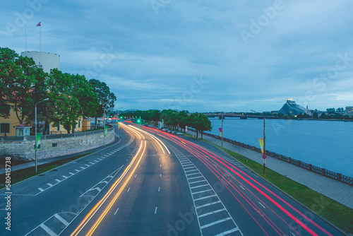 Night car traffic lights on road full of traffic