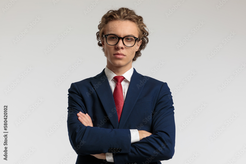 businessman crossing his arms at chest