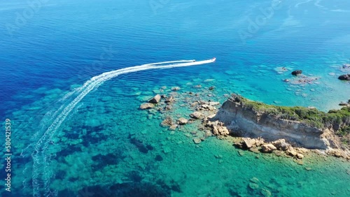 Wallpaper Mural Aerial view of a motor boat towing a tube. Zakynthos, Greece Torontodigital.ca