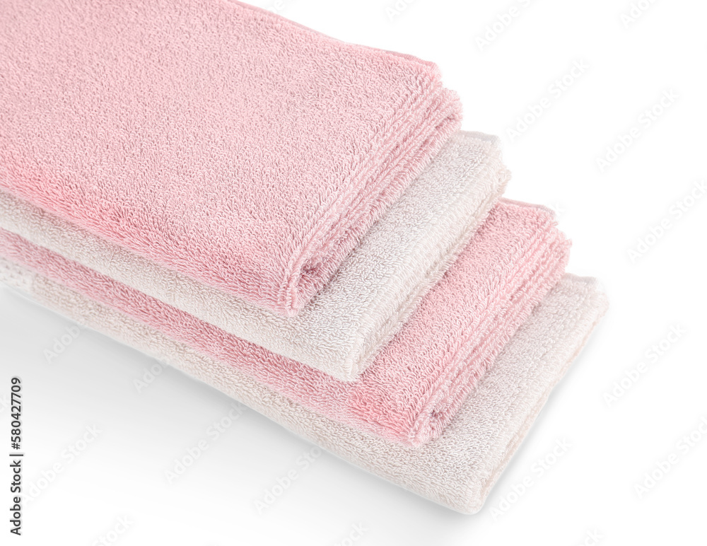Stack of folded soft towels isolated on white background Stack of folded soft towels isolated on white background