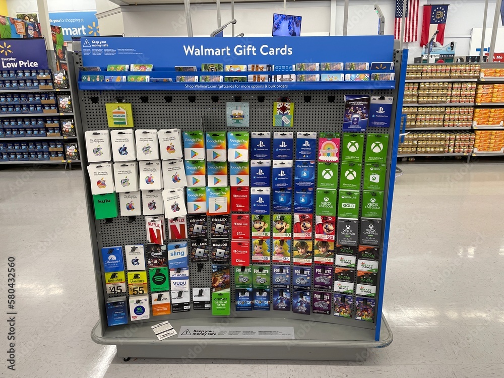 Walmart interior Gift Card center various gaming cards Stock Photo