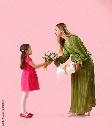 Cute little girl greeting h...