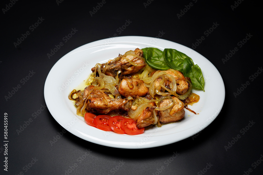 Chicken Do Pyaza isolated black background Indian food