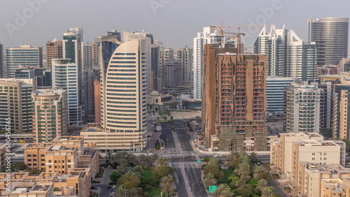 Skyscrapers in Barsha Heights district and low rise buildings in Greens district aerial timelapse. Dubai skyline © neiezhmakov