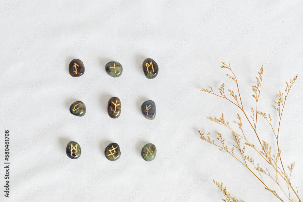 Set of rune stones for divination and fortune telling. Mystic still life with labradorite runes. Esoteric, occult , witchcraft rituals idea Set of rune stones for divination and fortune telling. Mystic still life with labradorite runes. Esoteric, occult , witchcraft rituals idea