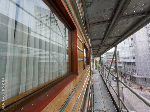 Living in a property with cladding issues. Scaffolding around a occupied building for cladding replacement works. Cladding crisis due to fire safety risks.