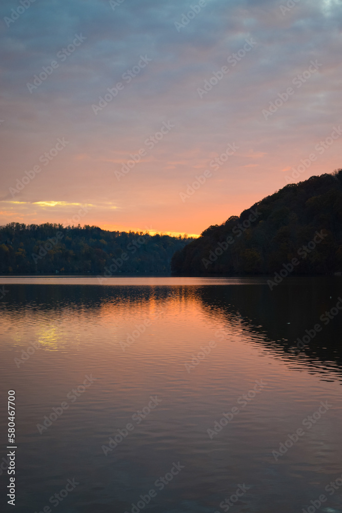 Fototapeta premium Sunset reflecting on Cheat Lake in West Virginia