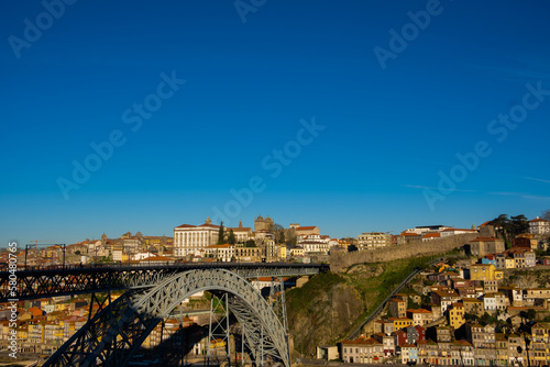 Spectacular Sunset Silhouette: The Majestic Dom Luís Bridge Adorned in Porto's Evening Glow