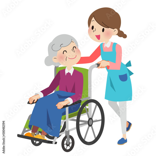 車椅子を押す介護士とおばあちゃん