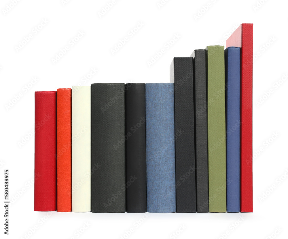 Many different hardcover books on white background Many different hardcover books on white background