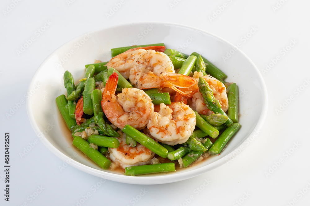 Asparagus stir fried with shrimp isolated white background Asparagus stir fried with shrimp isolated white background