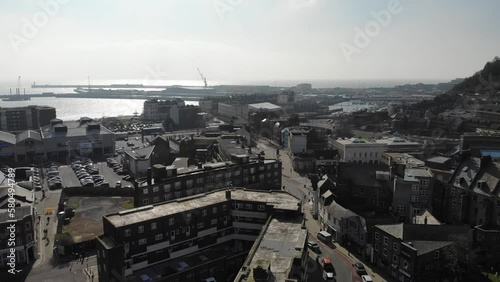 Slow flowing drone shot of Dover town and port in Kent, UK. 08.03.23 photo