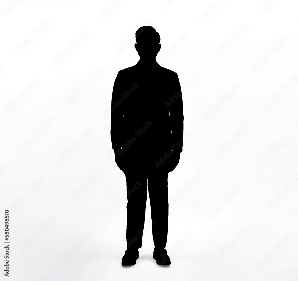 Silhouette of man standing, black color isolated on white background.Man in suit standing with hands against the body isolated vector silhouette.