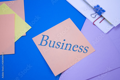 Business. Text on adhesive note paper. Event, celebration reminder message.