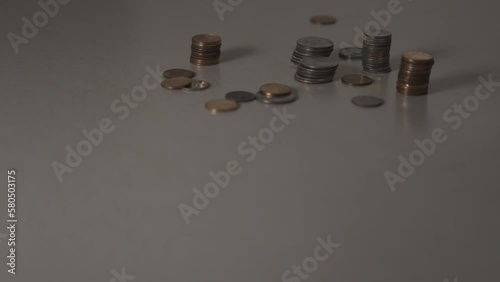 Picking up an organized stack of American quarters. photo