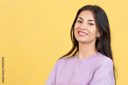 Happy hispanic woman smiling at the camera