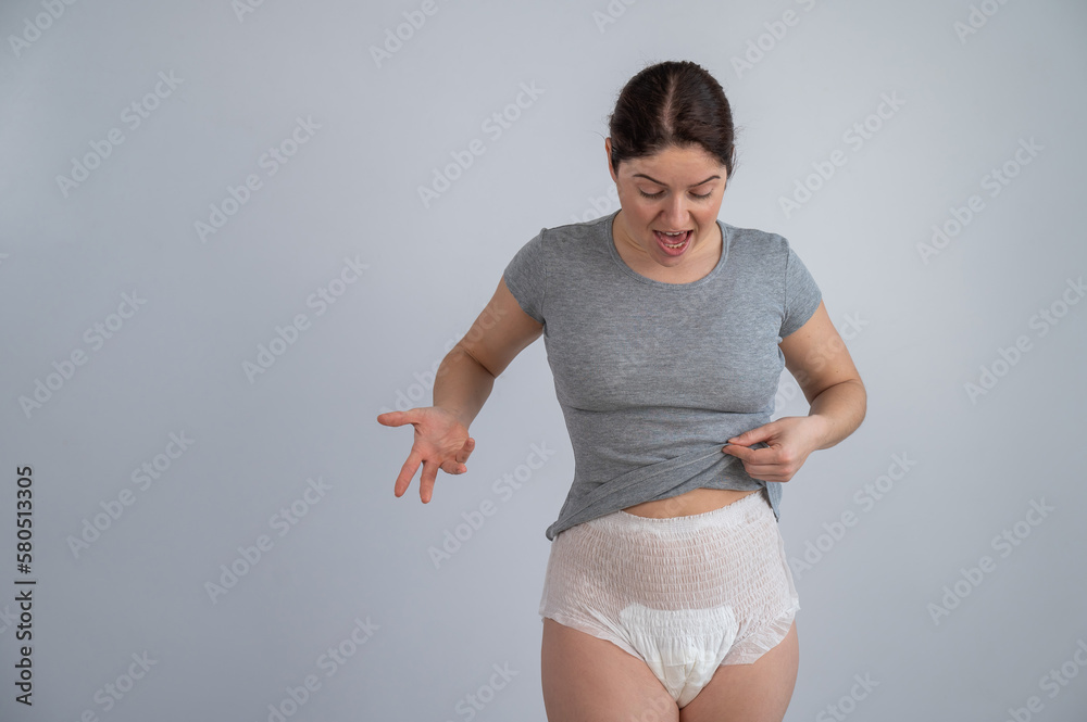 Foto de A woman in adult diapers. Urinary incontinence problem. do