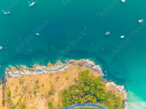 Fototapeta Naklejka Na Ścianę i Meble -  aerial top view The road around Phuket beach on the high mountain winds along the beach and various viewpoints..The road is steep and sharp.good view on the road. relax in beautiful nature..
