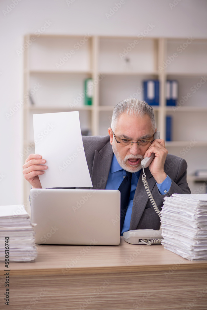 Old male employee and too much work in the office