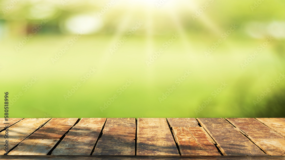 Wooden table top with natural green blurred background or various leaves, fresh bright sunlight, product empty concept. Wooden table top with natural green blurred background or various leaves, fresh bright sunlight, product empty concept.