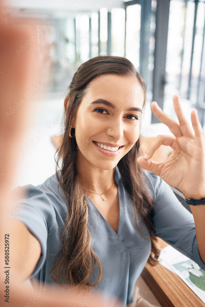 Selfie, portrait and business woman with ok sign for success, agreement and perfect emoji in office. Picture, smile and happy female worker with hand gesture for okay, good job and yes icon at desk