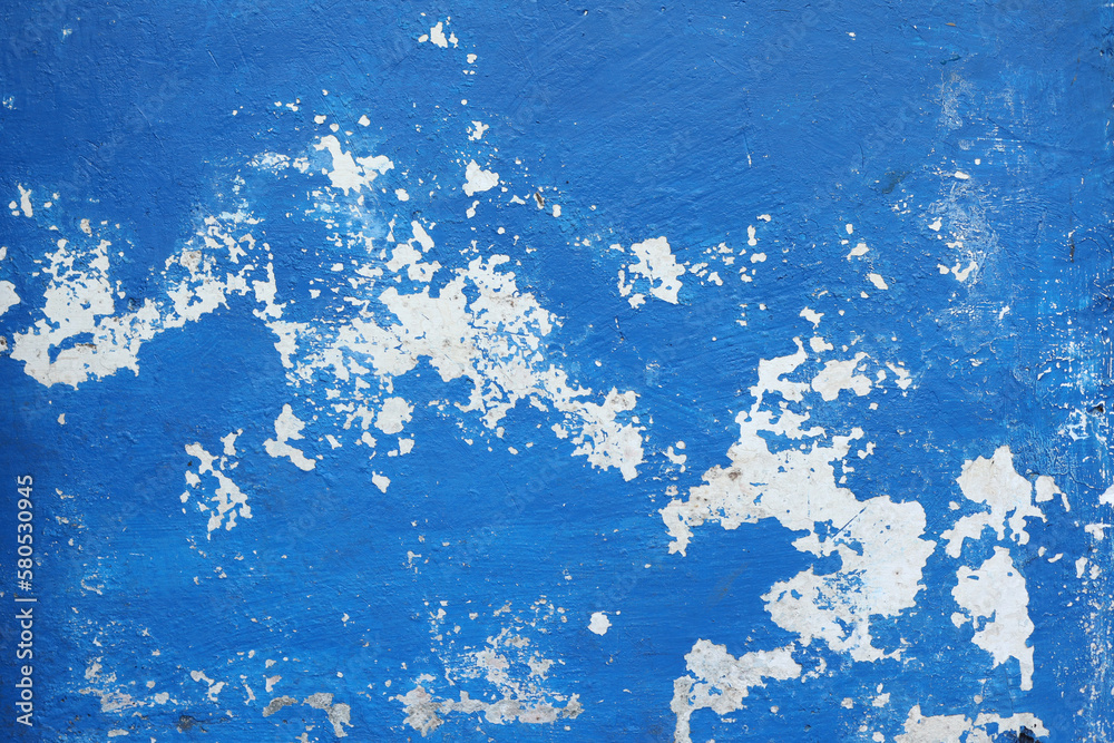 Peeling paint on wall seamless texture. Pattern of rustic blue grunge material.