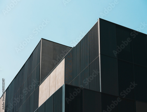 Architecture details Modern building Black Metal facade Industrial background