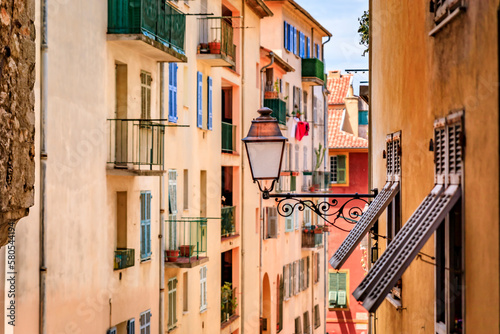 Traditional old houses with wooden shutters in the streets of Nice  France