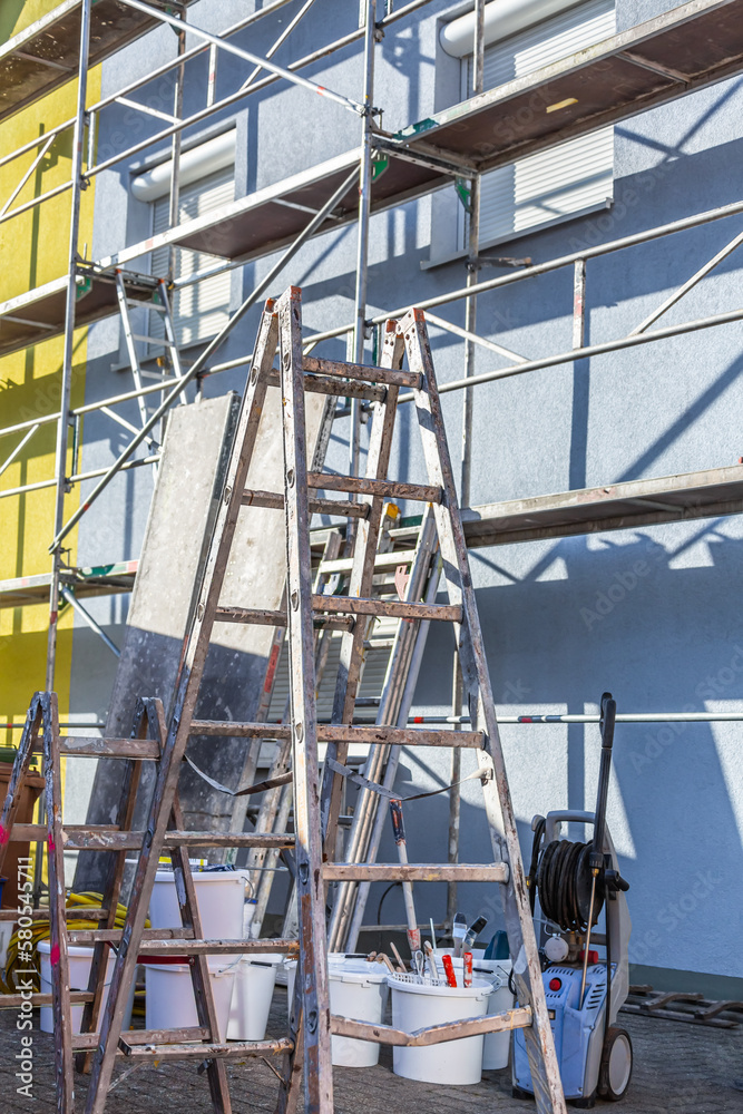 Modern house under construction with scaffold pole platform. Modern house under construction with scaffold pole platform.