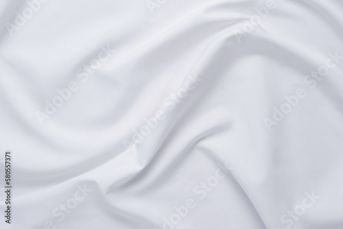 White fabric. luxurious white fabric texture background. Creases of satin, silk and cotton. © Ekkachai