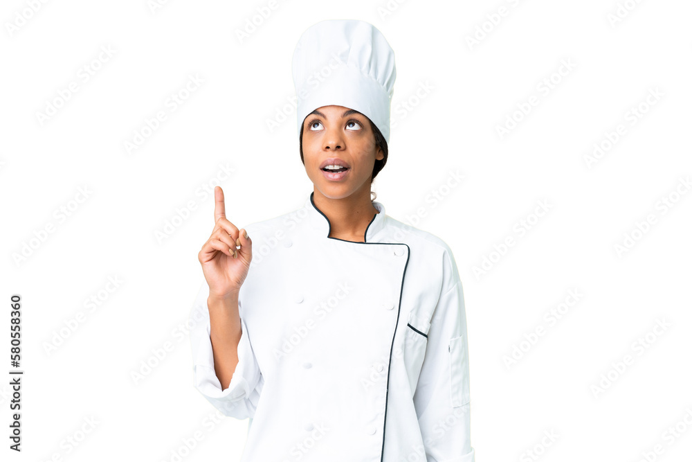 Young African American chef over isolated chroma key background thinking an idea pointing the finger up Young African American chef over isolated chroma key background thinking an idea pointing the finger up