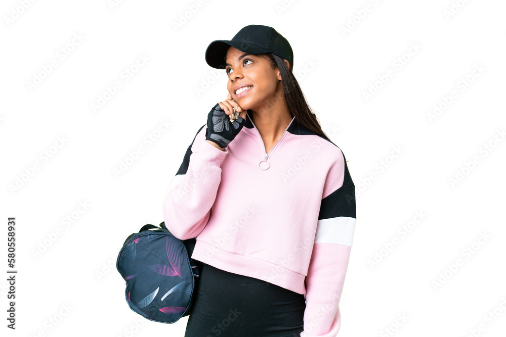 Young sport African American woman with sport bag over isolated chroma key background thinking an idea while looking up Young sport African American woman with sport bag over isolated chroma key background thinking an idea while looking up