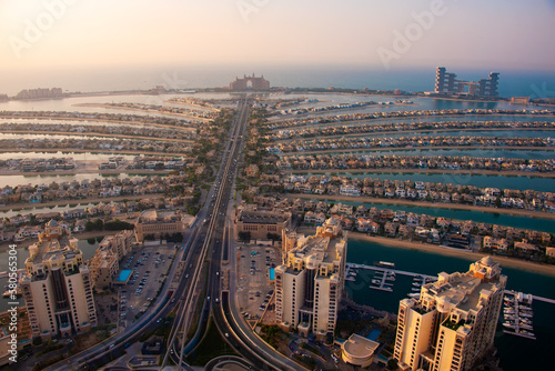 Photography Palm Jumeirah island in Dubai on sunset, modern architecture, beaches and villas