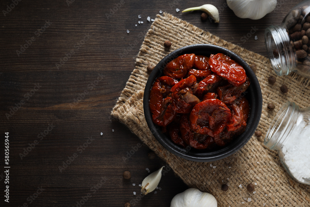 Concept of tasty food - sun-dried tomato, space for text Concept of tasty food - sun-dried tomato, space for text