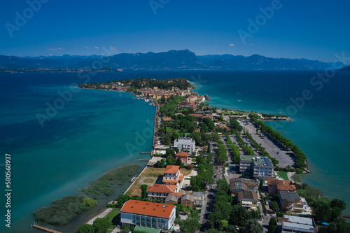 Sirmione, Lake Garda, Italy. Aerial view of the Sirmione peninsula. In the background the mountains of Lake Garda