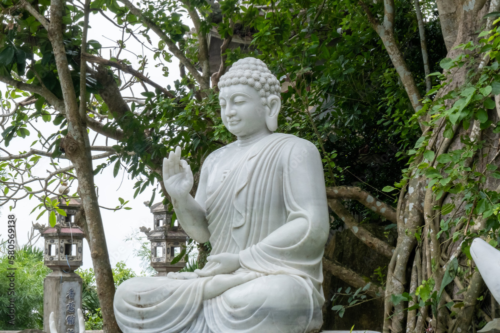 The sculpture of a marble Buddha on the Marble Mountains in the Da Nang region. Vietnam