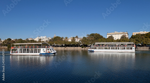 Boats in Guadalquivir river, Seville, Andalusia, Spain