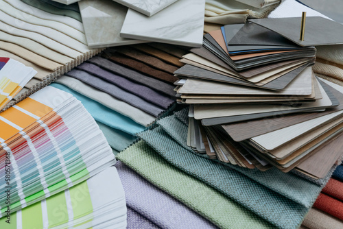 Variety of fabric color samples arranged together photo