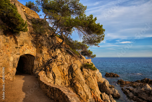 Coastal Path With Tunnel Under Rock In Lloret De Mar, Spain