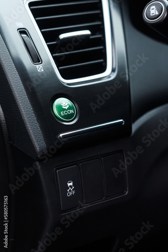Economic green mode and electronic stability programme buttons in a modern car near air conditioning system © Andrey Myagkov