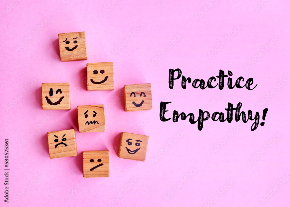 Many cubes with different emotions on pink  background . Practice empathy Concept   - obrazy, fototapety, plakaty 