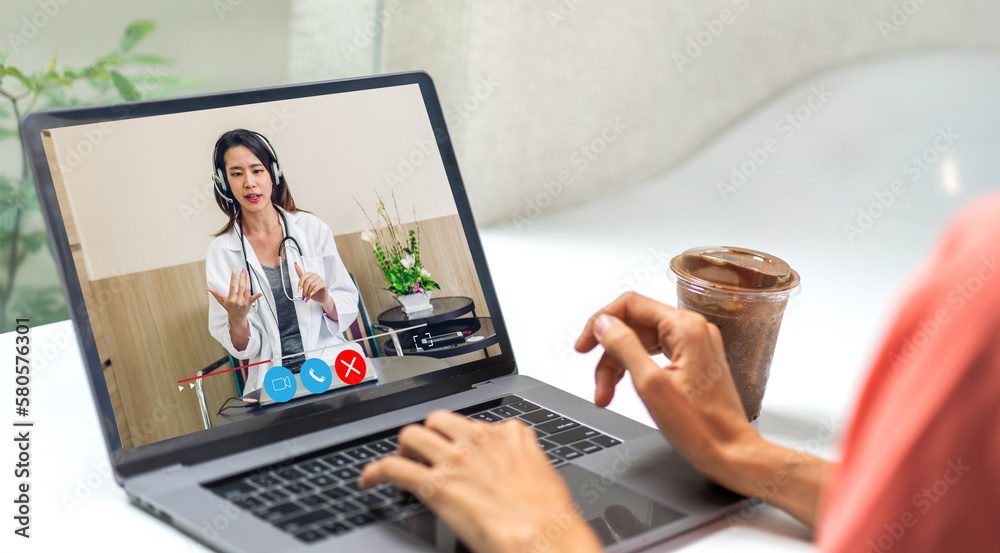 Woman talk speak using laptop computer and video conference online with doctor and stethoscope service help support team discussing and consulting talk video chat call checkup information at home Woman talk speak using laptop computer and video conference online with doctor and stethoscope service help support team discussing and consulting talk video chat call checkup information at home