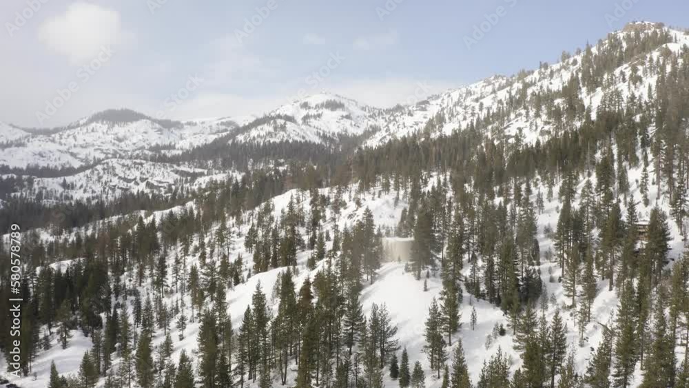Aerial 4k beautiful drone pan up a mountain with green pine trees in Lake Tahoe Aerial 4k beautiful drone pan up a mountain with green pine trees in Lake Tahoe