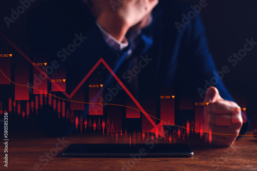Property values ​​are steadily declining. Unhappy businessman, business downturn. company stocks fall in value, economic crisis, global economy slows down, trading drops, high risk investments.