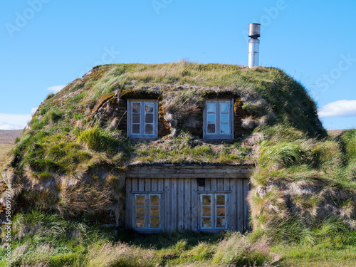Authentic turf house blue sky